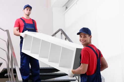 Removal team preparing a move in South Kensington street setting