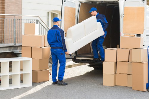 A moving team handling a flat move in a period property