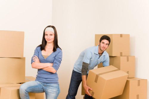 Packed moving boxes and furniture ready for transport in South Kensington