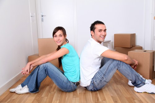 Packed boxes and furniture prepared for removal truck hire