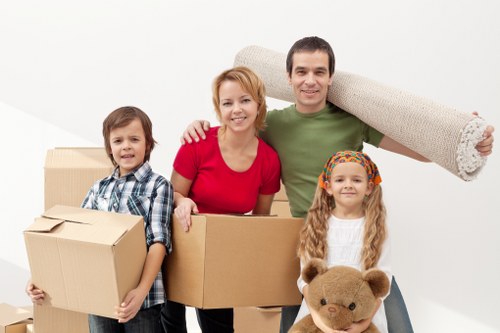 Moving household items through a South Kensington residential street with parking considerations