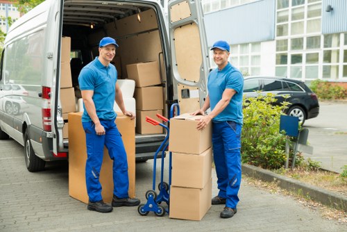 Removal van outside a South Kensington property with careful loading