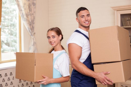 Professional movers handling fragile items during a South Kensington move